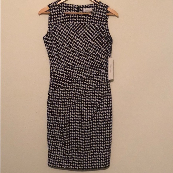 Calvin Klein Dresses & Skirts - Calvin Klein sunburst sheath dress